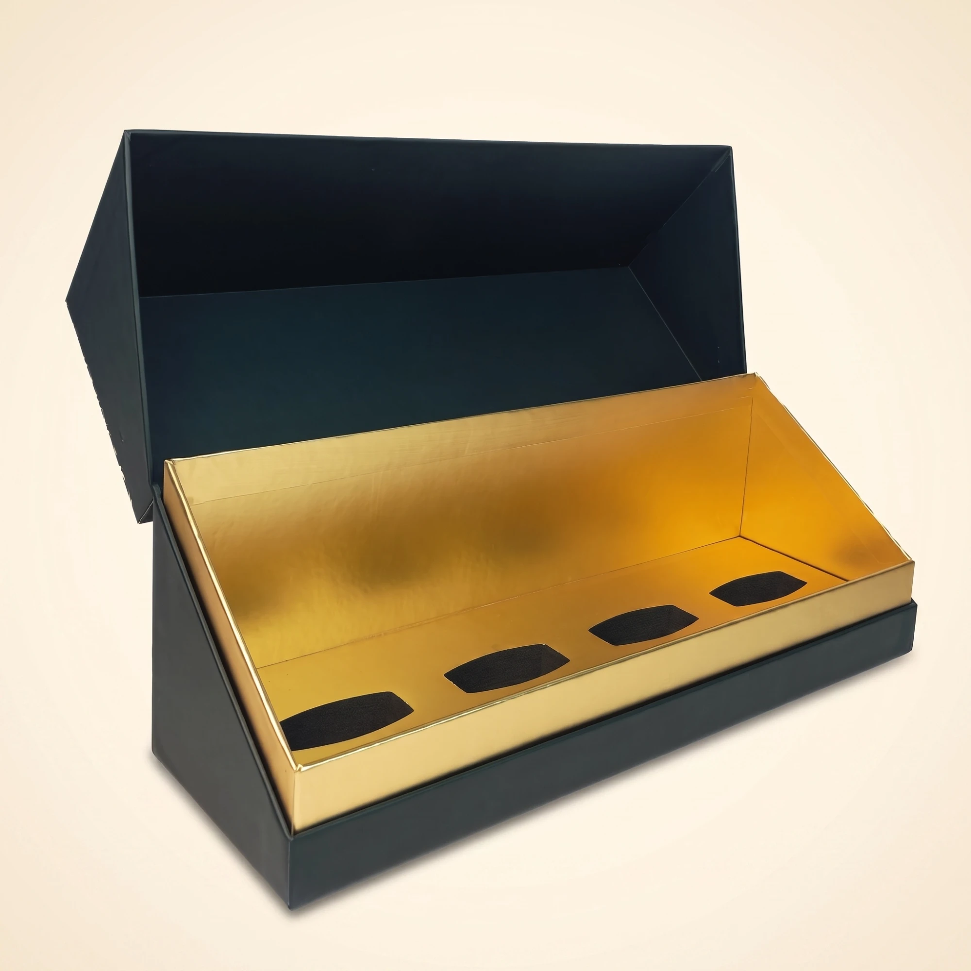 Dark green perfume box with gold lined interior and four bottle slots